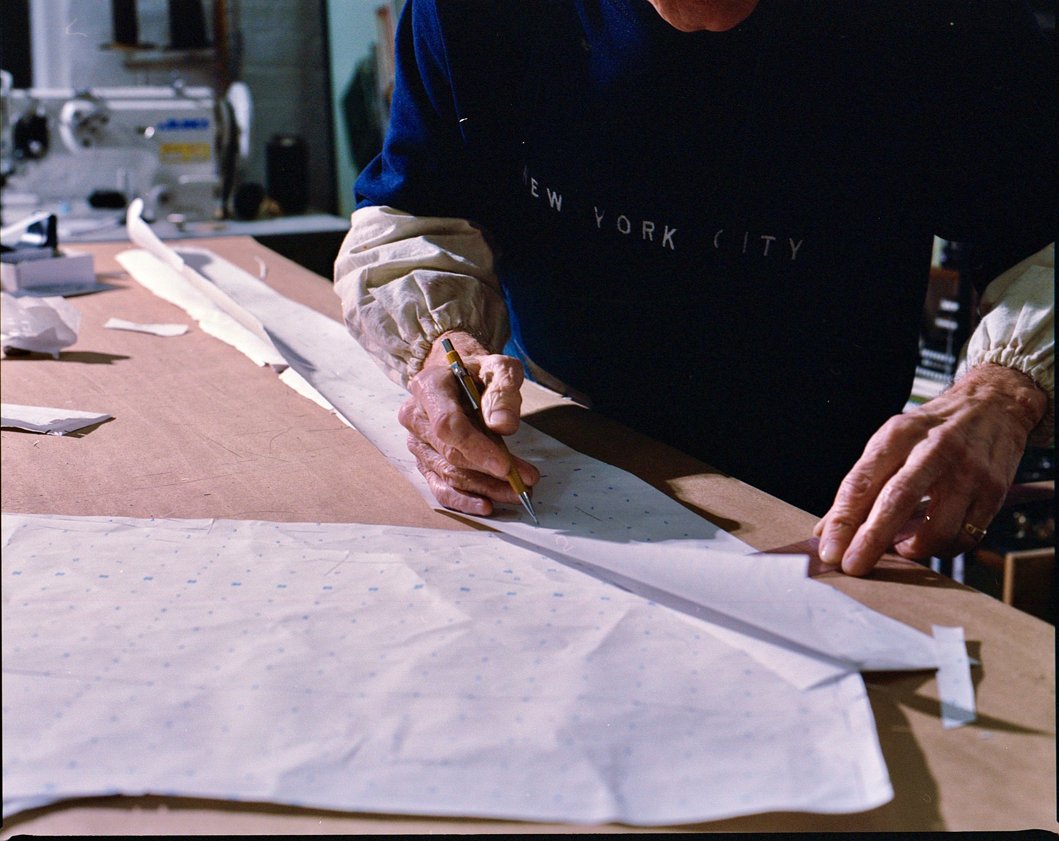 Franco Maselli drafting a pattern by hand, NYC Garment District